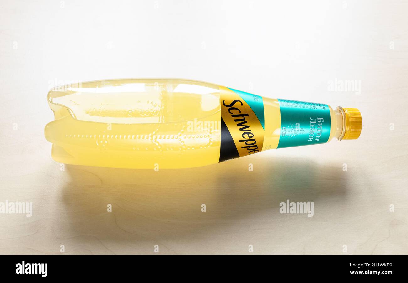 MOSCOW, RUSSIA - JUNE 10, 2021: lying russian edition plastic bottle of Schweppes Bitter Lemon water on light brown board. Schweppes introduced its br Stock - Alamy