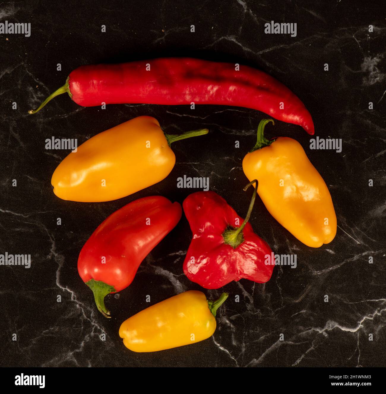 Still life Food photography collection of red and yellow peppers Stock Photo