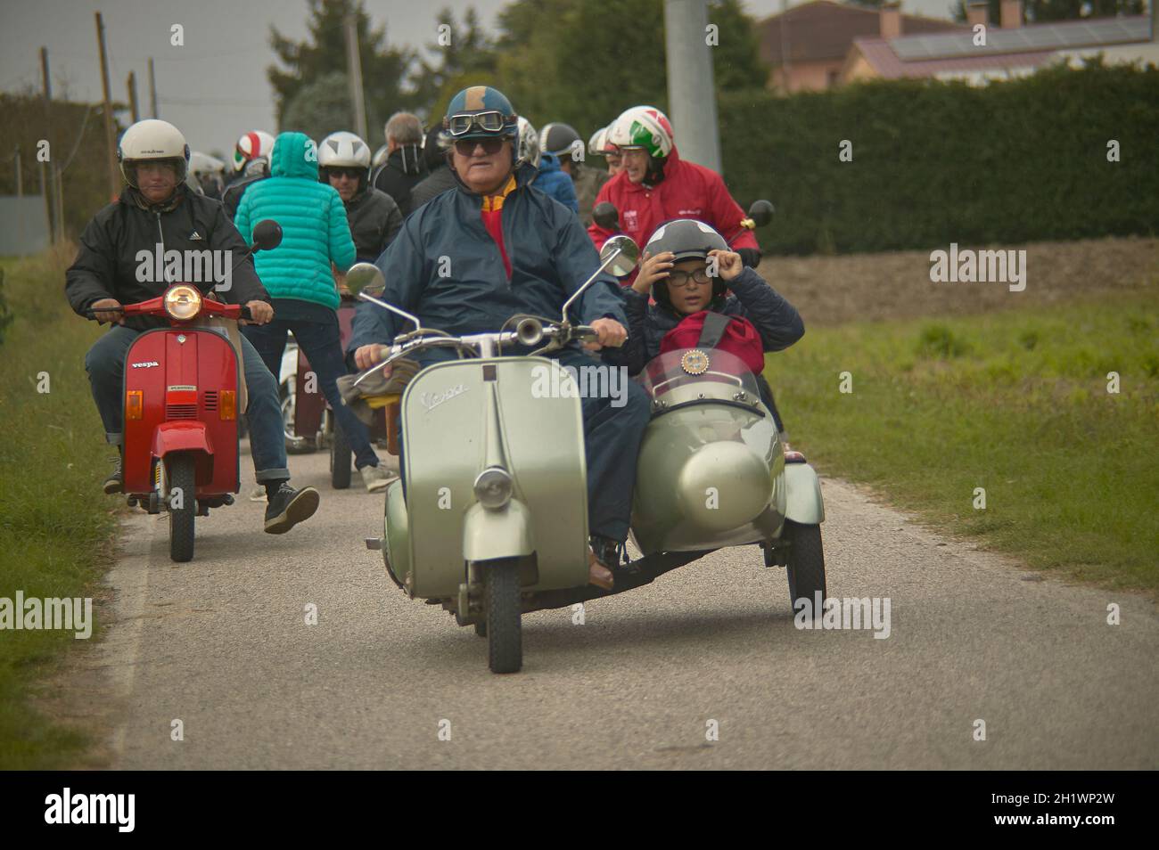 Old man red vespa scooter hi-res stock photography and images - Alamy