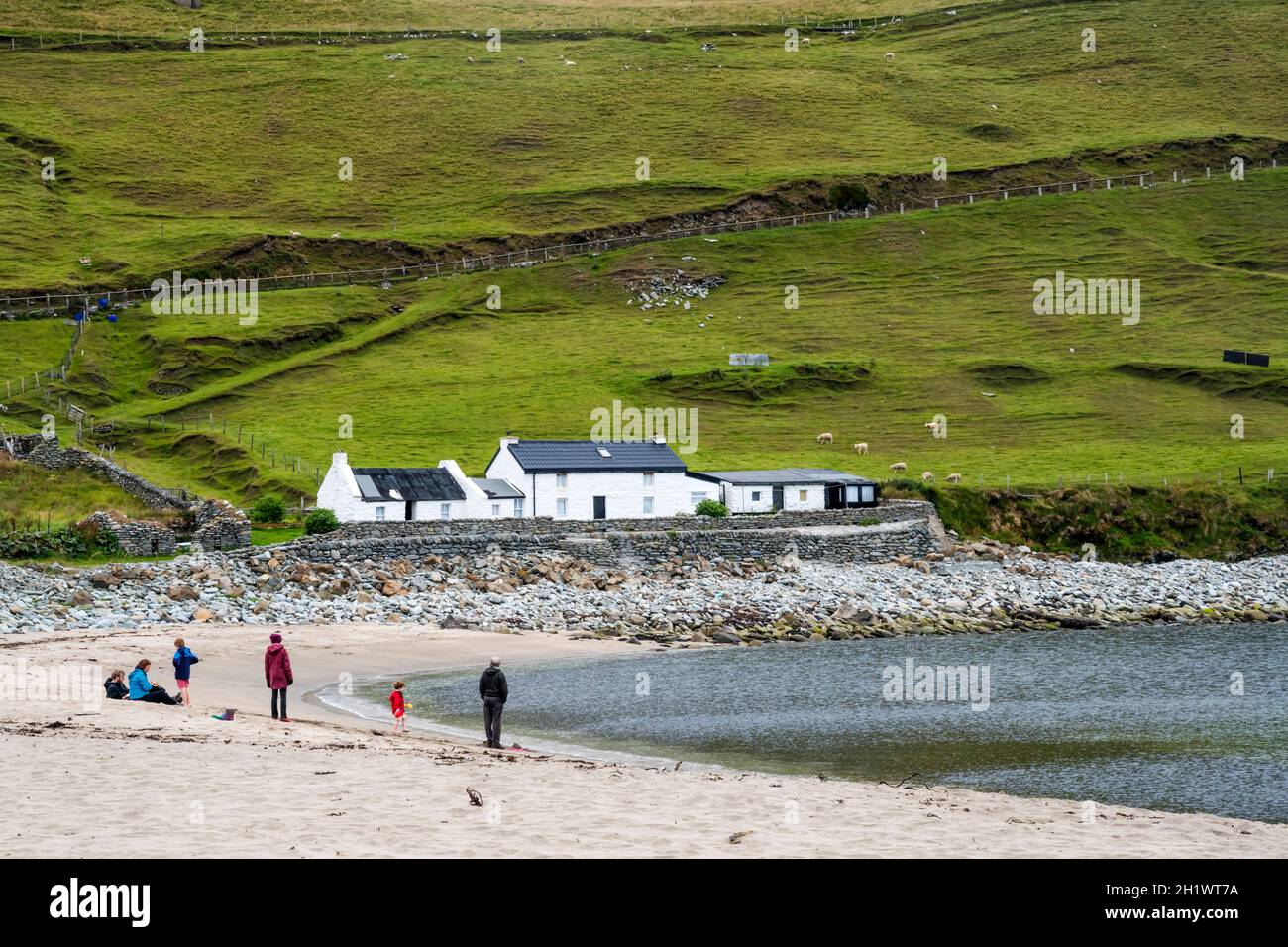 People on the beach at Norwick on Unst, Shetland Islands. Stock Photo