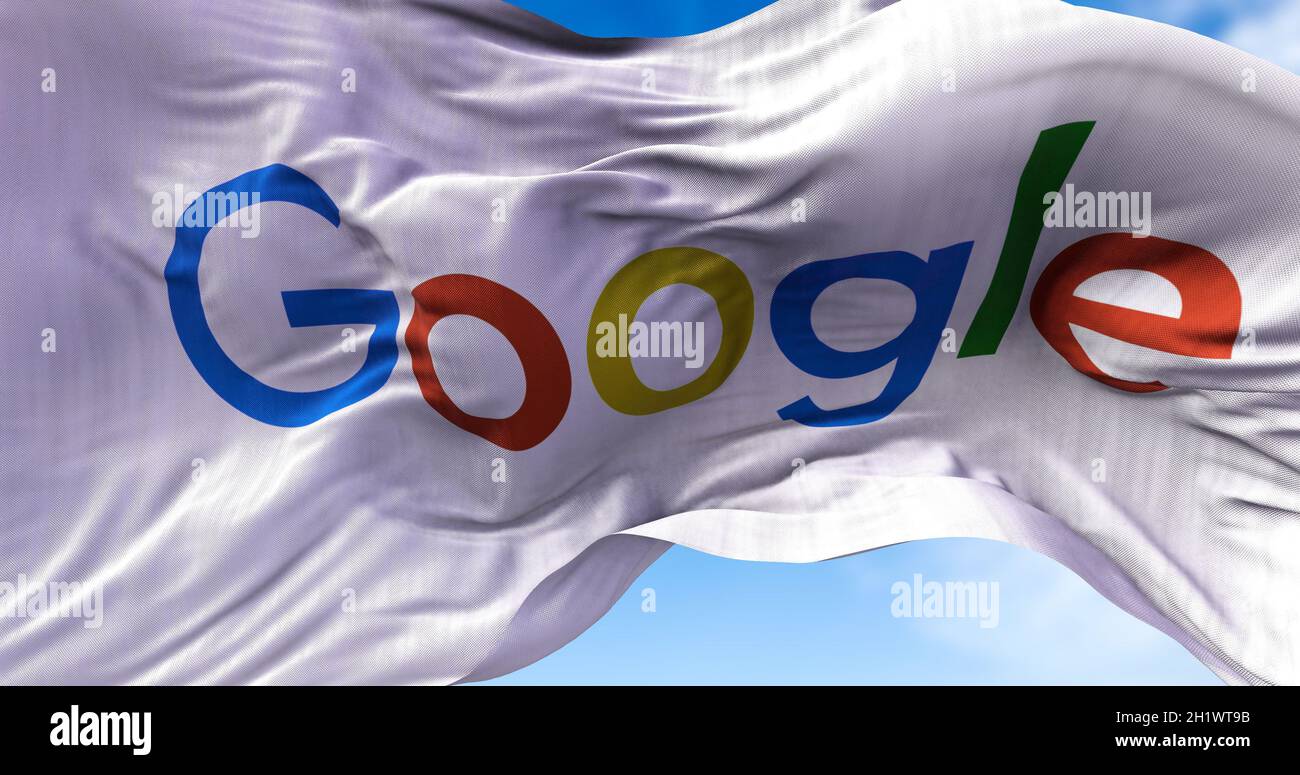 Mountain View, CA, USA, July 2021: White flag with the Google logo waving in the wind. Google is an American multinational company that specializes in Stock Photo