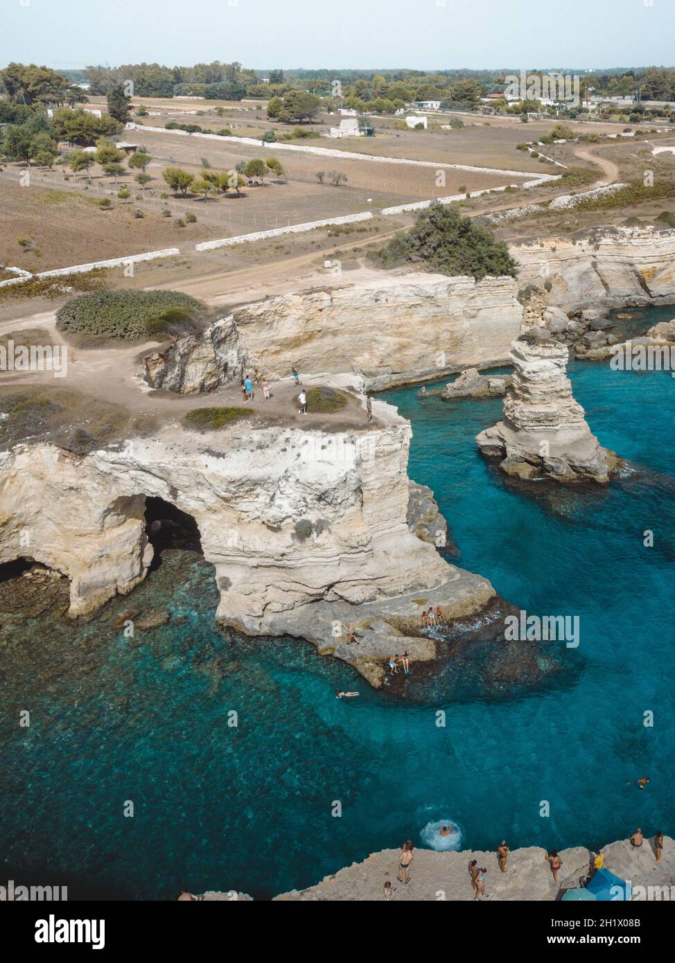 a great view on faraglioni di sant&rsquo;andrea in puglia Stock Photo - Alamy