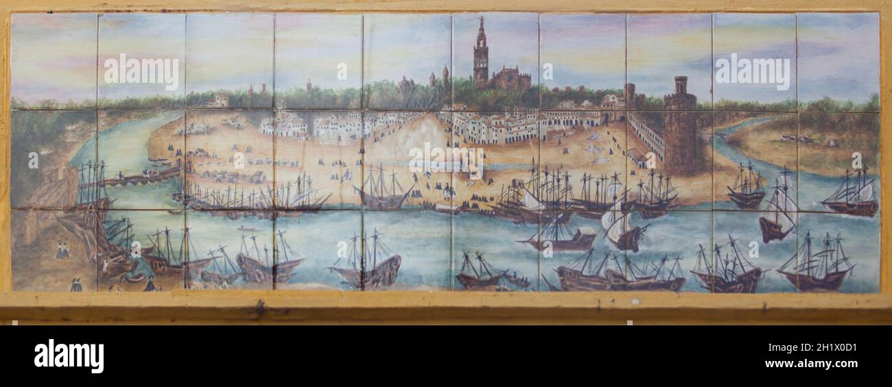Seville, Spain - Sept 27th 2020: Seville in the 16th century glazed tile top panel. Original from Alonso Sanchez Coello painter Stock Photo