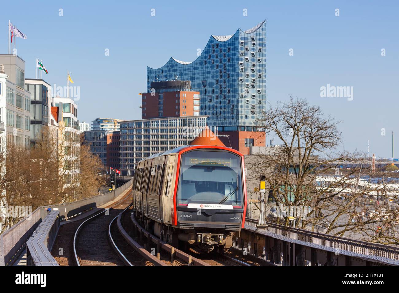 Hamburg, Germany - April 20, 2021: Hochbahn Metro train station Landungsbrücken with Elbphilharmonie building  in Hamburg, Germany. Stock Photo
