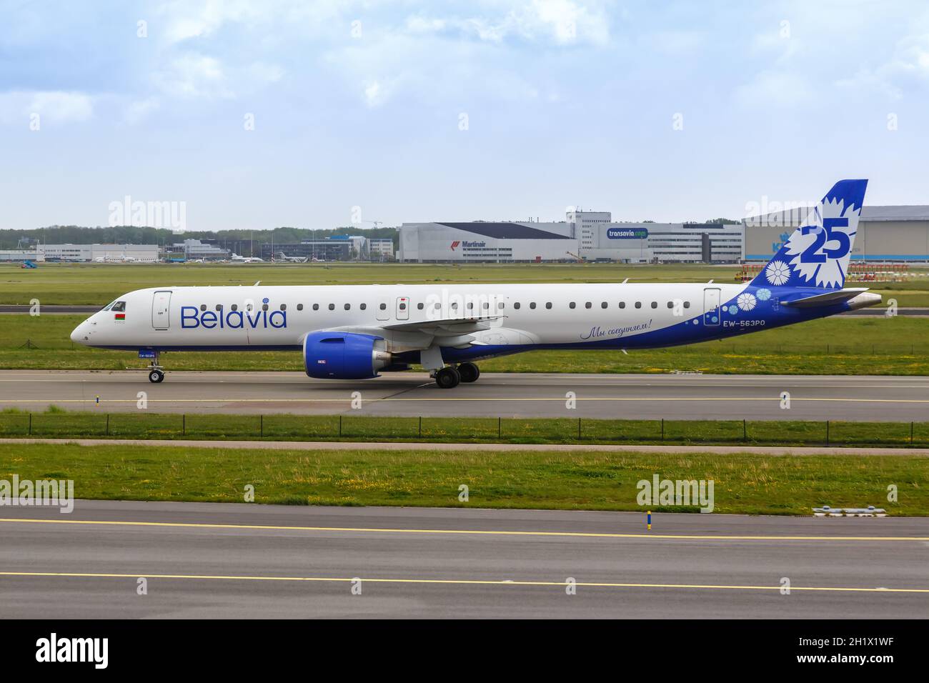 Amsterdam, Netherlands - May 21, 2021: Belavia Embraer 195 E2 airplane at Amsterdam Schiphol airport (AMS) in the Netherlands. Stock Photo
