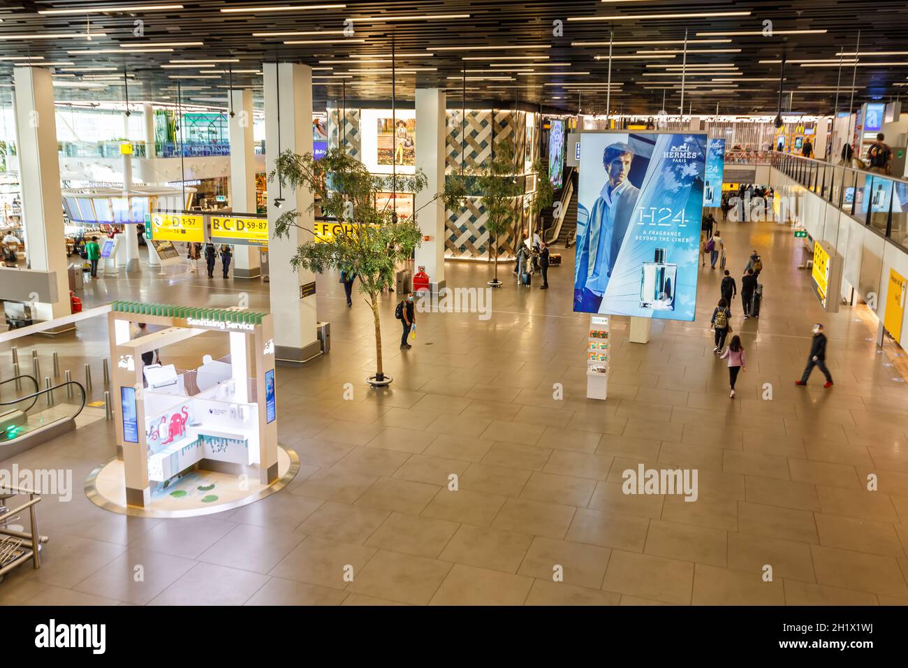 Amsterdam, Netherlands - May 29, 2021: Terminal building of Amsterdam Schiphol airport (AMS) in the Netherlands. Stock Photo