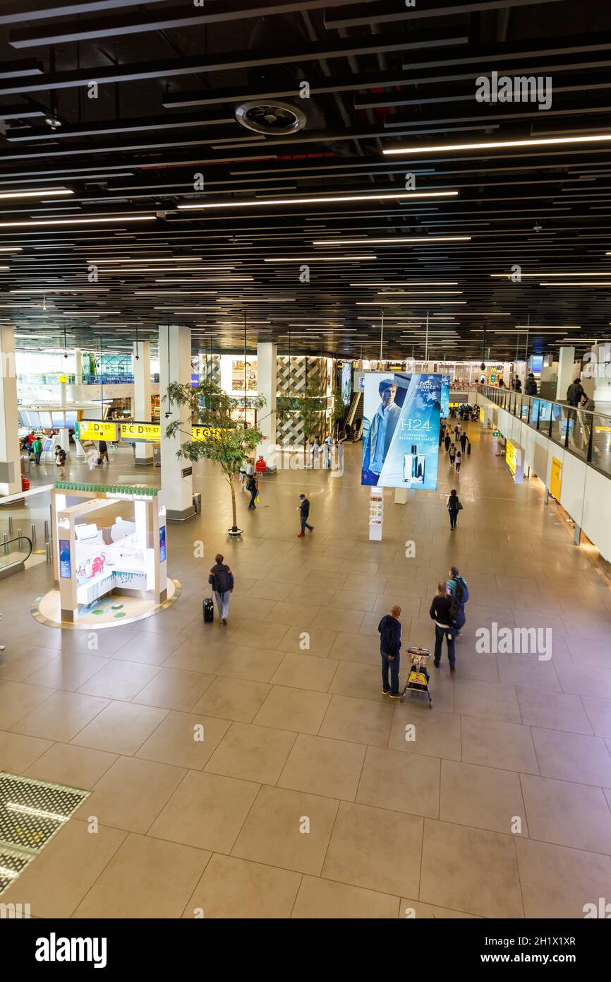Amsterdam, Netherlands - May 29, 2021: Terminal building of Amsterdam Schiphol airport (AMS) portrait format in the Netherlands. Stock Photo