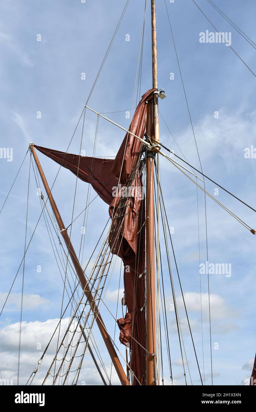 close up of magnificent ships mast and rigging against a deep blue sky ...