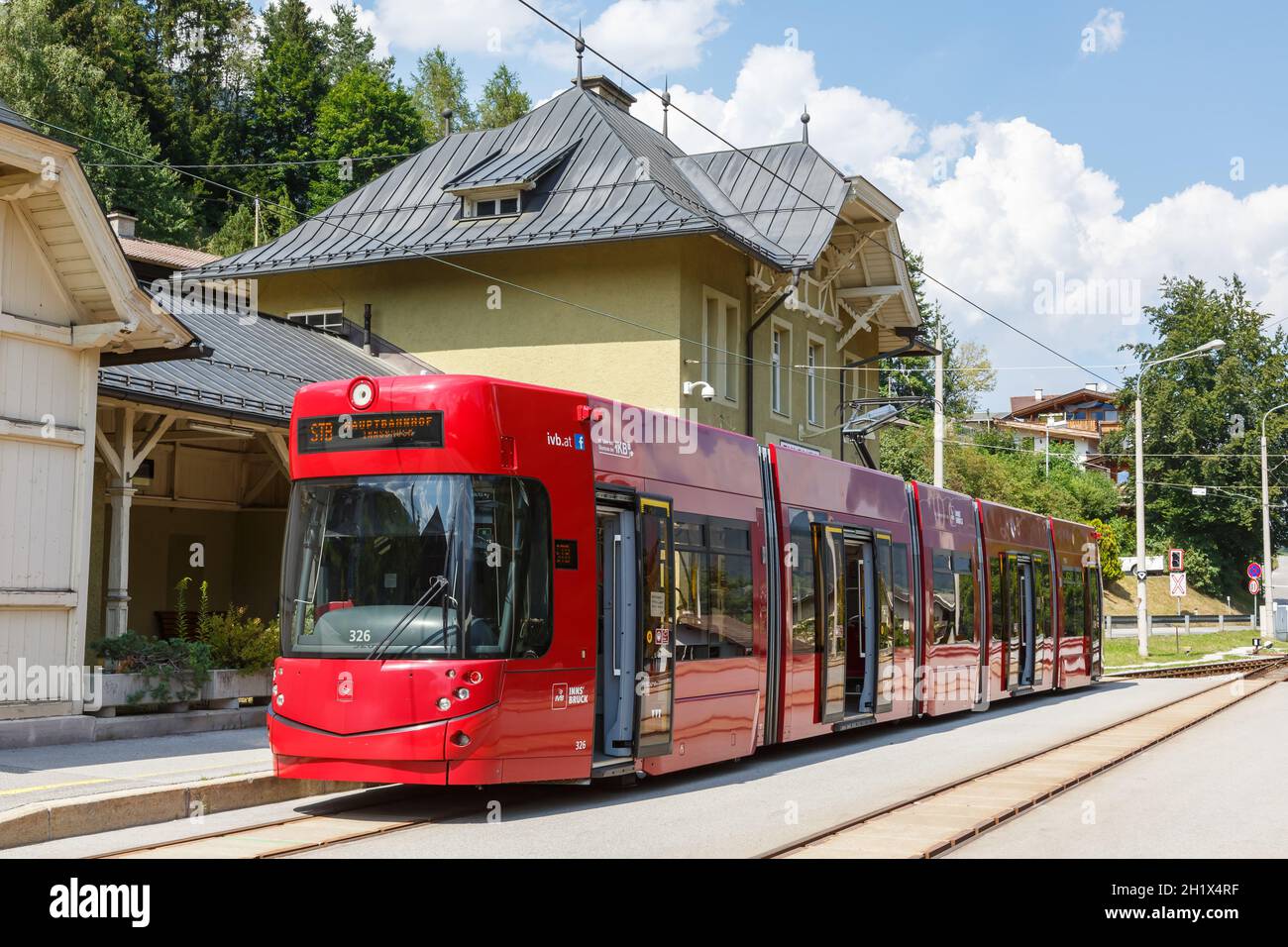Fulpmes, Austria - August 1, 2020: Stubaitalbahn Innsbruck Tram Bombardier train Fulpmes station in Austria. Stock Photo