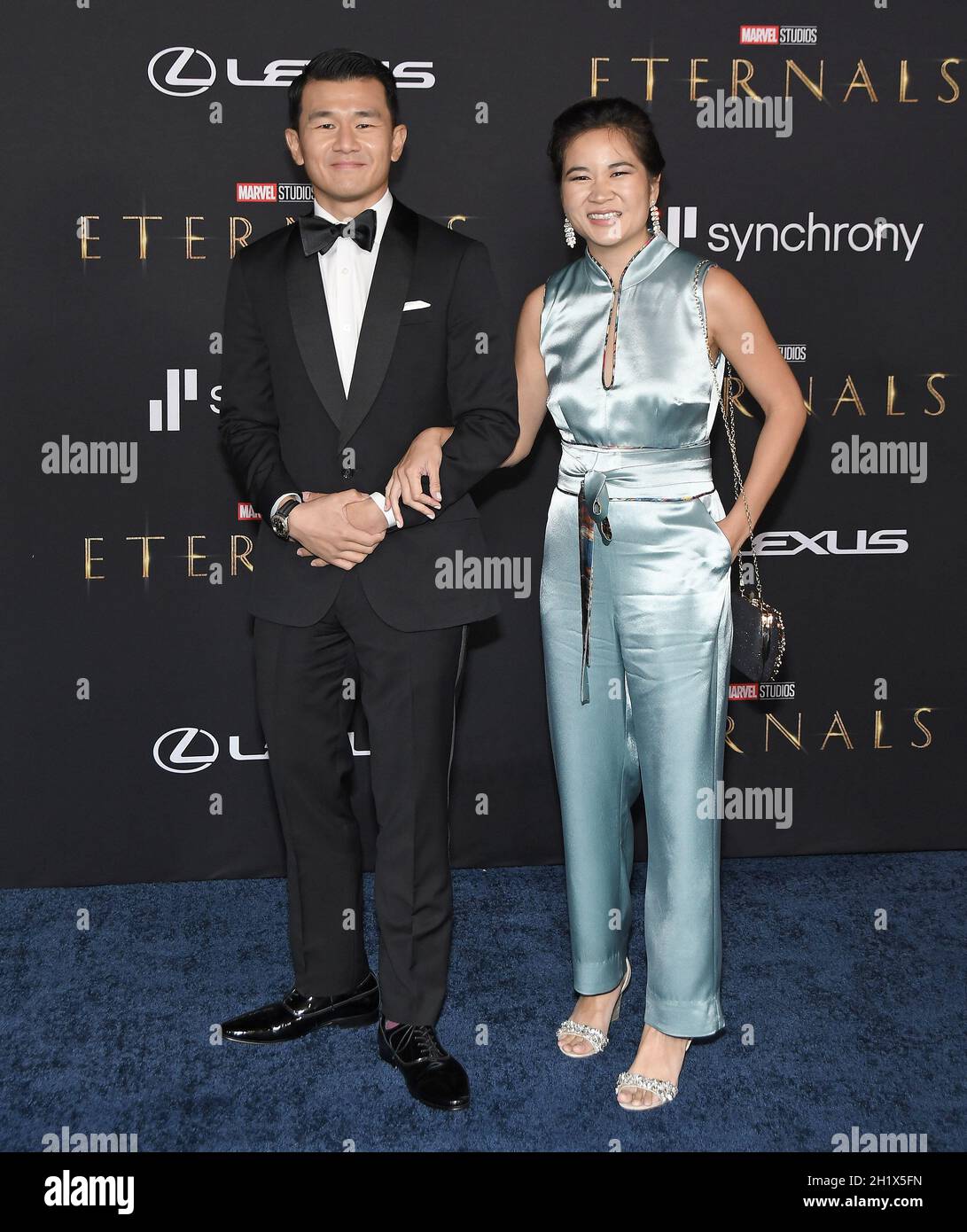 Hollywood, CA, October 18, 2021. (L-R) Ronny Chieng and Wife Hannah