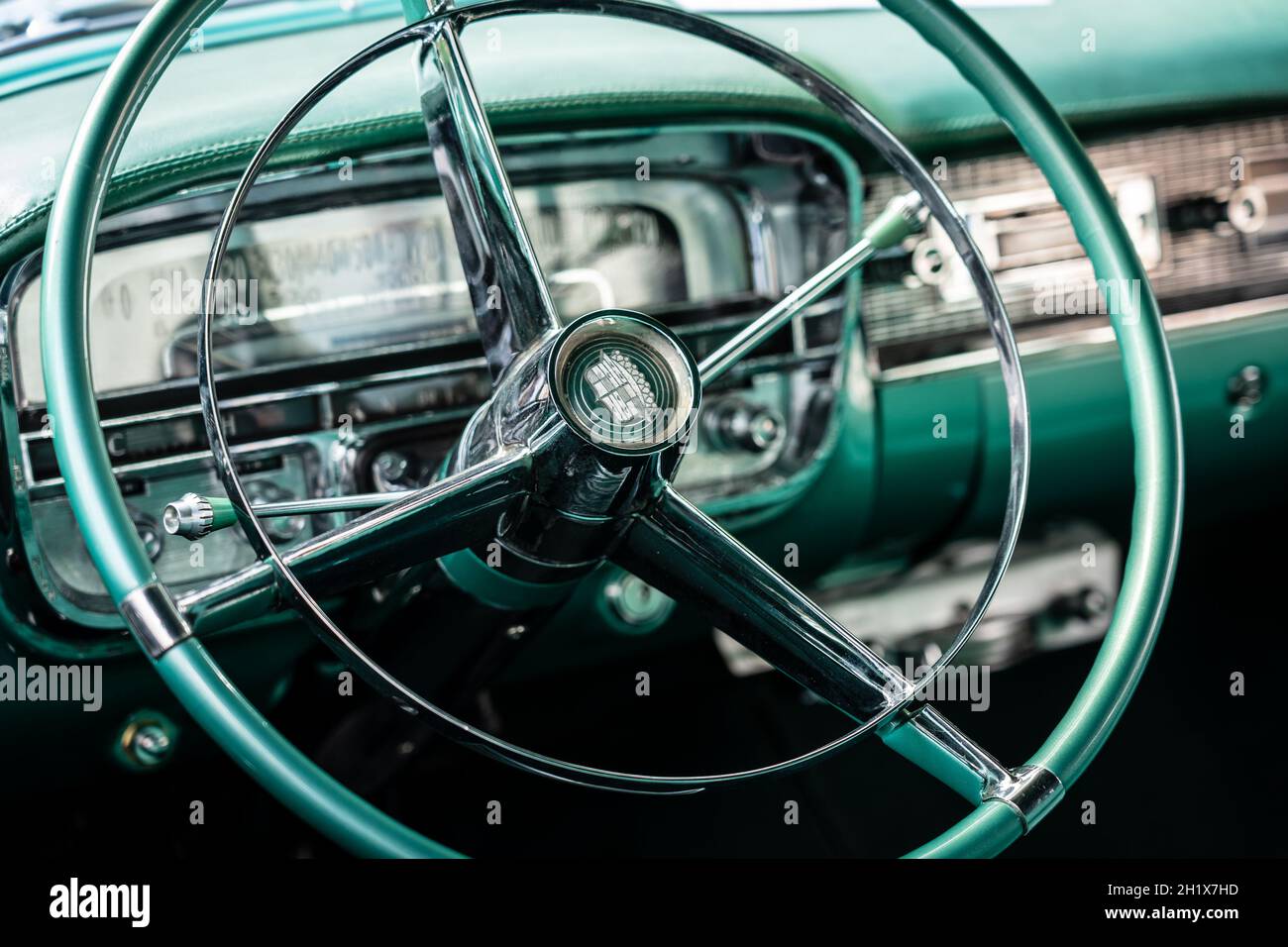 DIEDERSDORF, GERMANY - AUGUST 21, 2021: The dashboard of luxury car Cadillac Series 62 Coupe de Ville, 1953. Close-up. Focus on the foreground. The ex Stock Photo