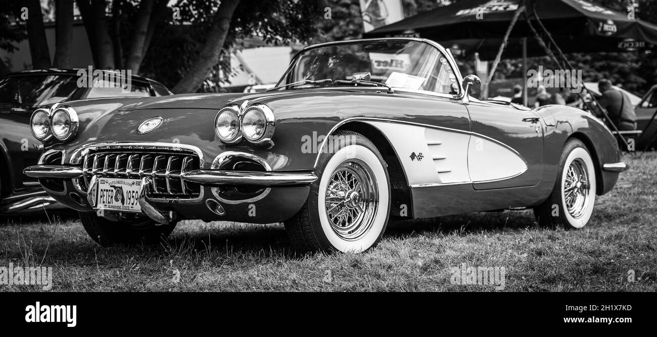DIEDERSDORF, GERMANY - AUGUST 21, 2021: The sports car Chevrolet Corvette (C1), 1960. Black and white. The exhibition of 'US Car Classics'. Stock Photo