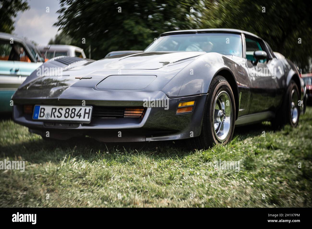DIEDERSDORF, GERMANY - AUGUST 21, 2021: The sports car Chevrolet Corvette Stingray (C3). Focus on center. Swirly bokeh. The exhibition of 'US Car Clas Stock Photo