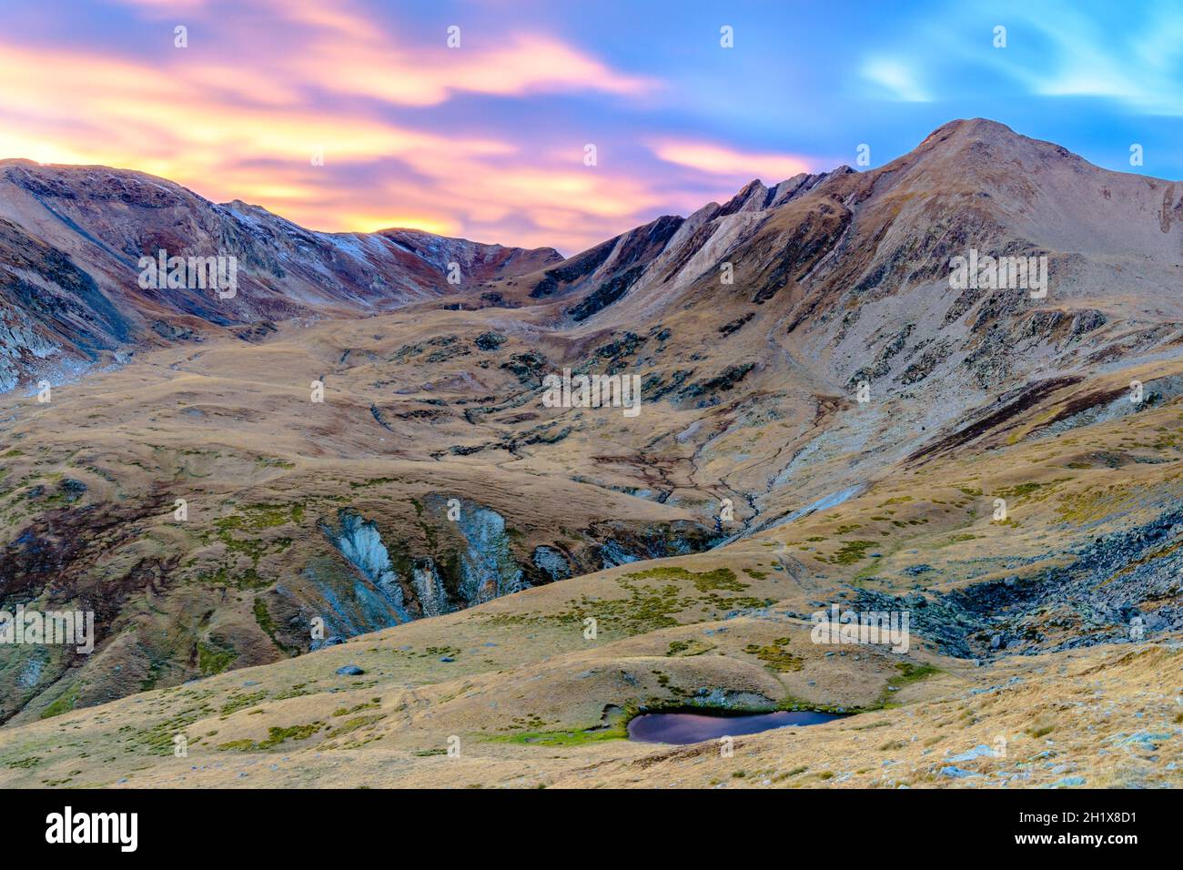 Mountain landscape at sunset Stock Photo - Alamy