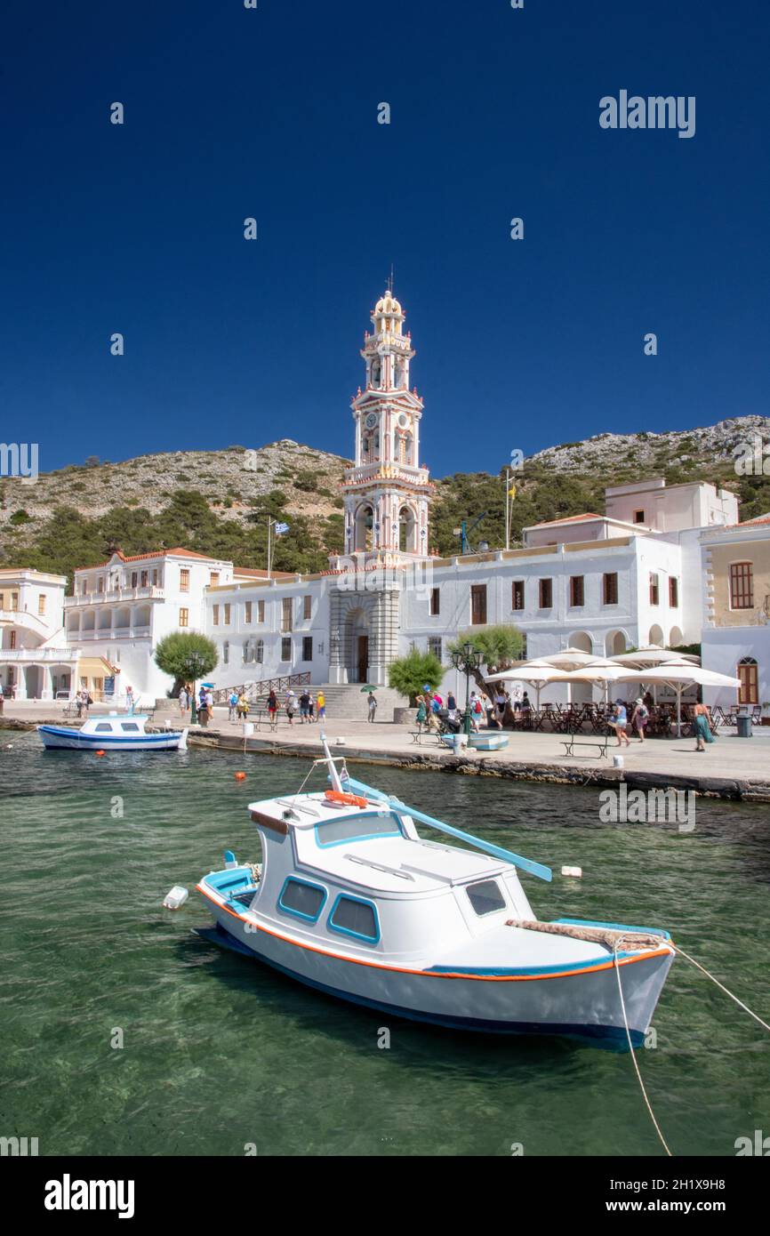 SYMI, Greece - JUN 03, 2021. SYMI, Greece - JUN 03, 2021. Panormitis Monastery of Archangel Michael in the southwest of the island of Symi is an impor Stock Photo