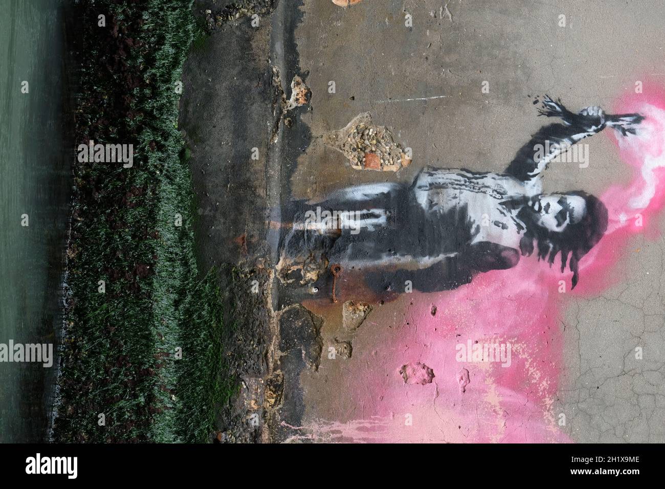 A new work of British street artist Banksy has been sighted in Venice on a building along the Rio de Ca Foscari canal in Venice, Italy May 15, 2019. Stock Photo
