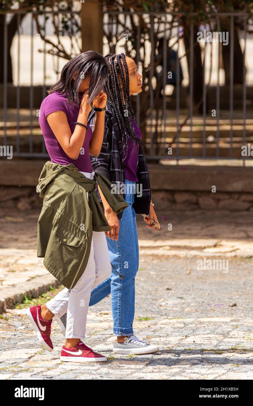 AXUM, ETHIOPIA, APRIL 27th.2019: Ordinary carefree tigray native girls walking on the street in center of Aksum on April 27, 2019 in Aksum, Tigray, Et Stock Photo