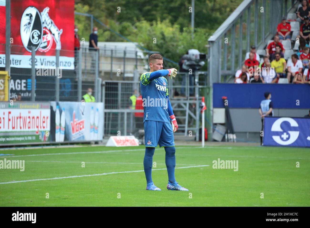 Mund abputzen und weitermachen: Torwart Timo Horn (Koeln) beim Spiel der 1. FBL: 21-22: 4. Sptg. SC Freiburg vs 1. FC Köln  DFL REGULATIONS PROHIBIT A Stock Photo