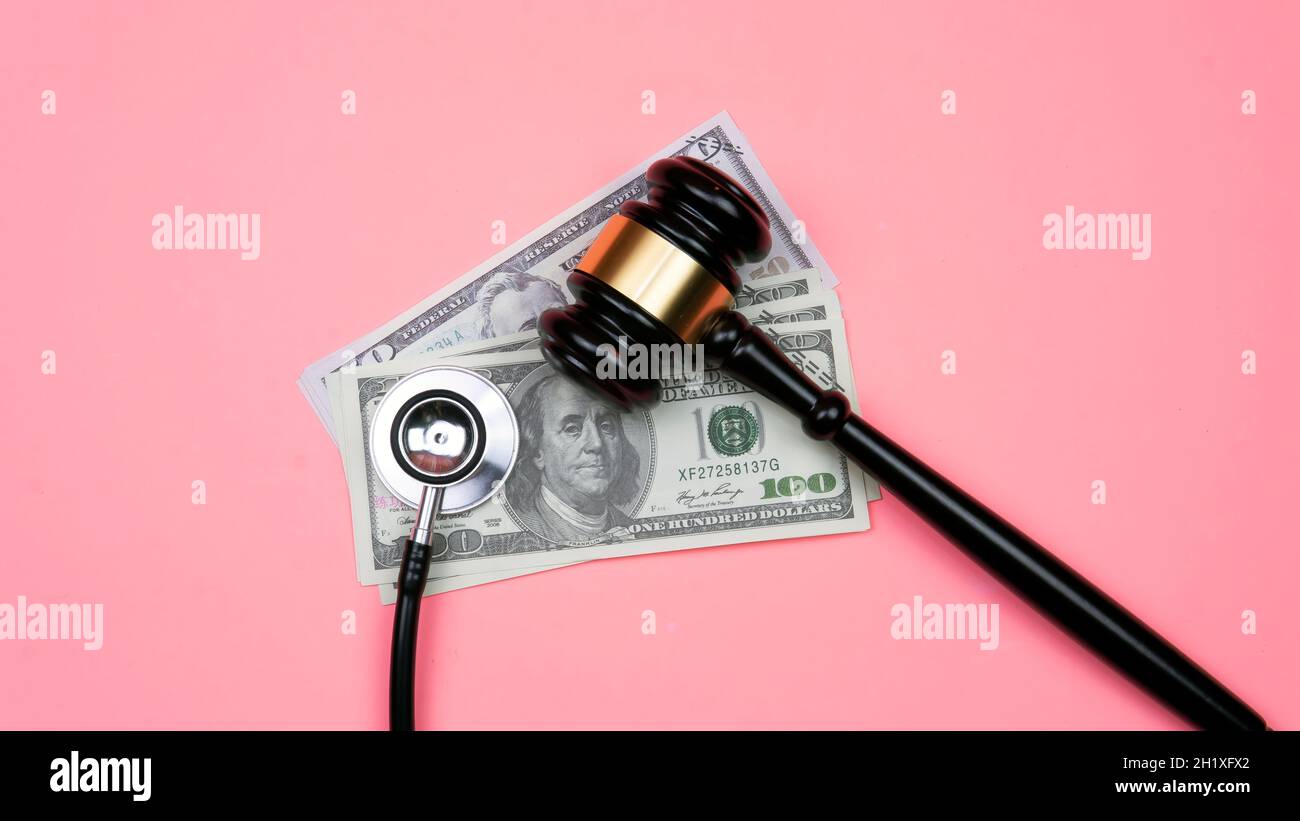 Selective focus on gavel and stethoscope. Medical fraud and scam concept. Life insurance fraud Stock Photo