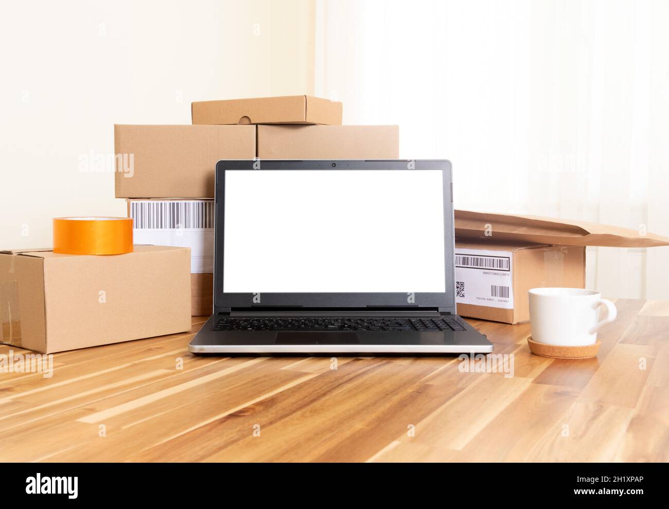 Online shopping boxes and laptop screen mockup. online start up concept