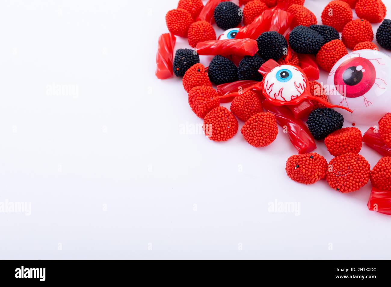 Composition of multiple halloween trick or treat eyeball sweets with ...