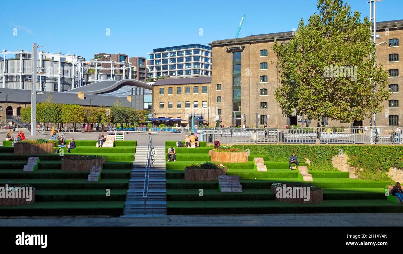 UAL University of the Arts Central St Martins Granary Square campus exterior building and astro turf steps in Kings Cross London N1 UK   KATHY DEWITT Stock Photo
