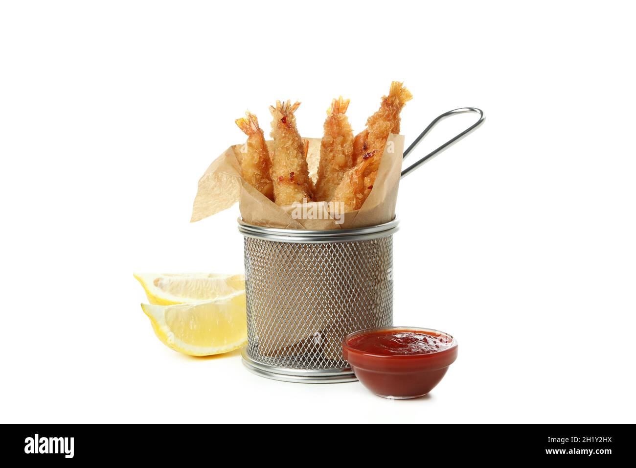 Deep-fried shrimp in deep fryer isolated on white background Stock