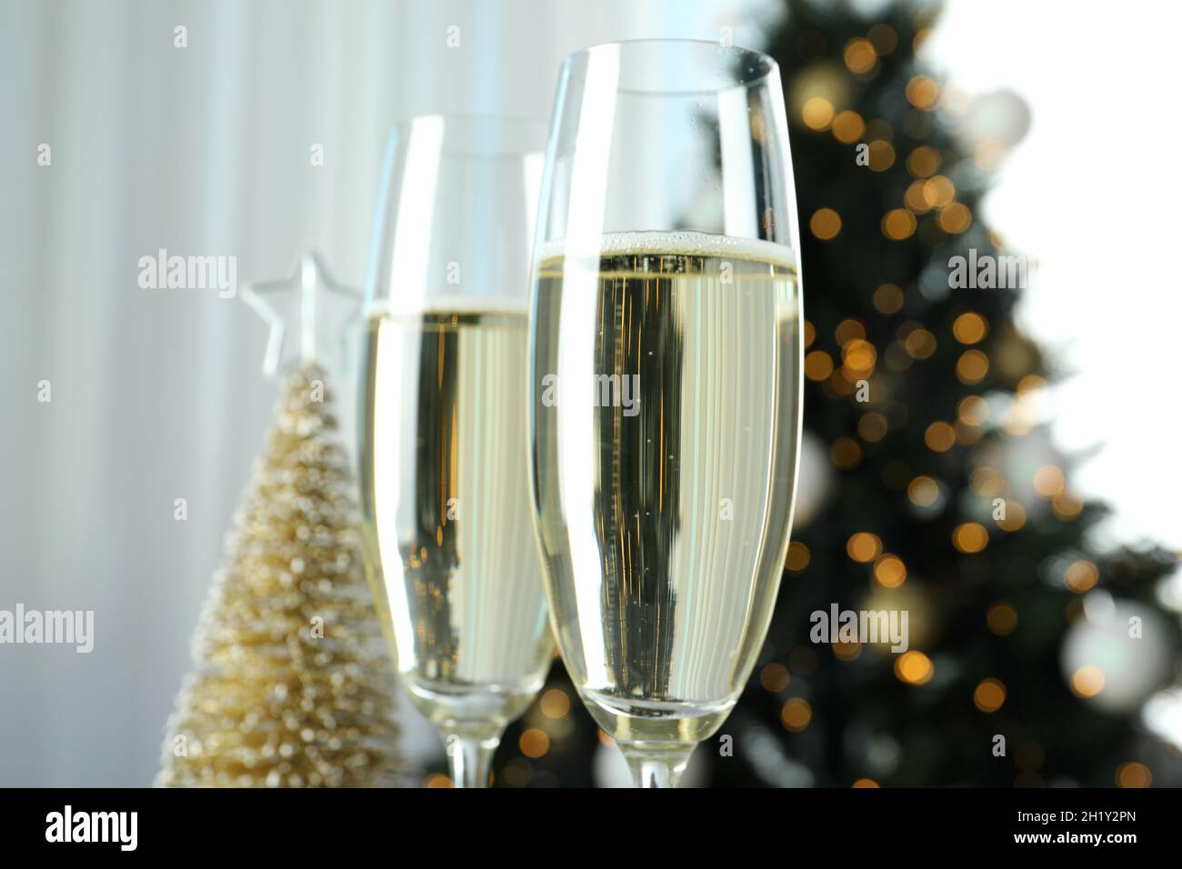 Concept of New Year celebration with glasses of champagne Stock Photo ...