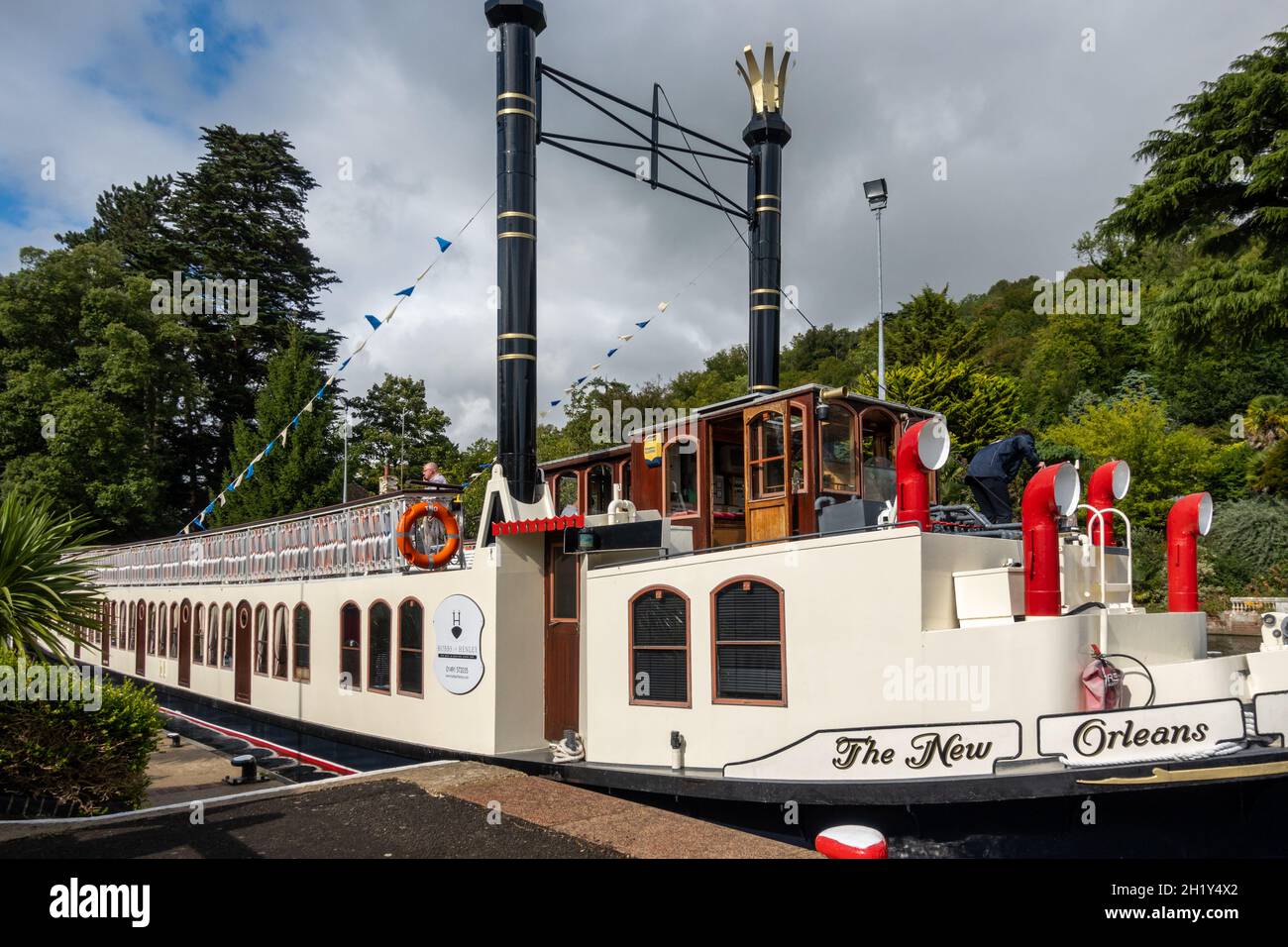 The striking tourist paddle steamer 'The New Orleans' navigating through Marsh Lock on the River Thames near Henley on Thames. Stock Photo