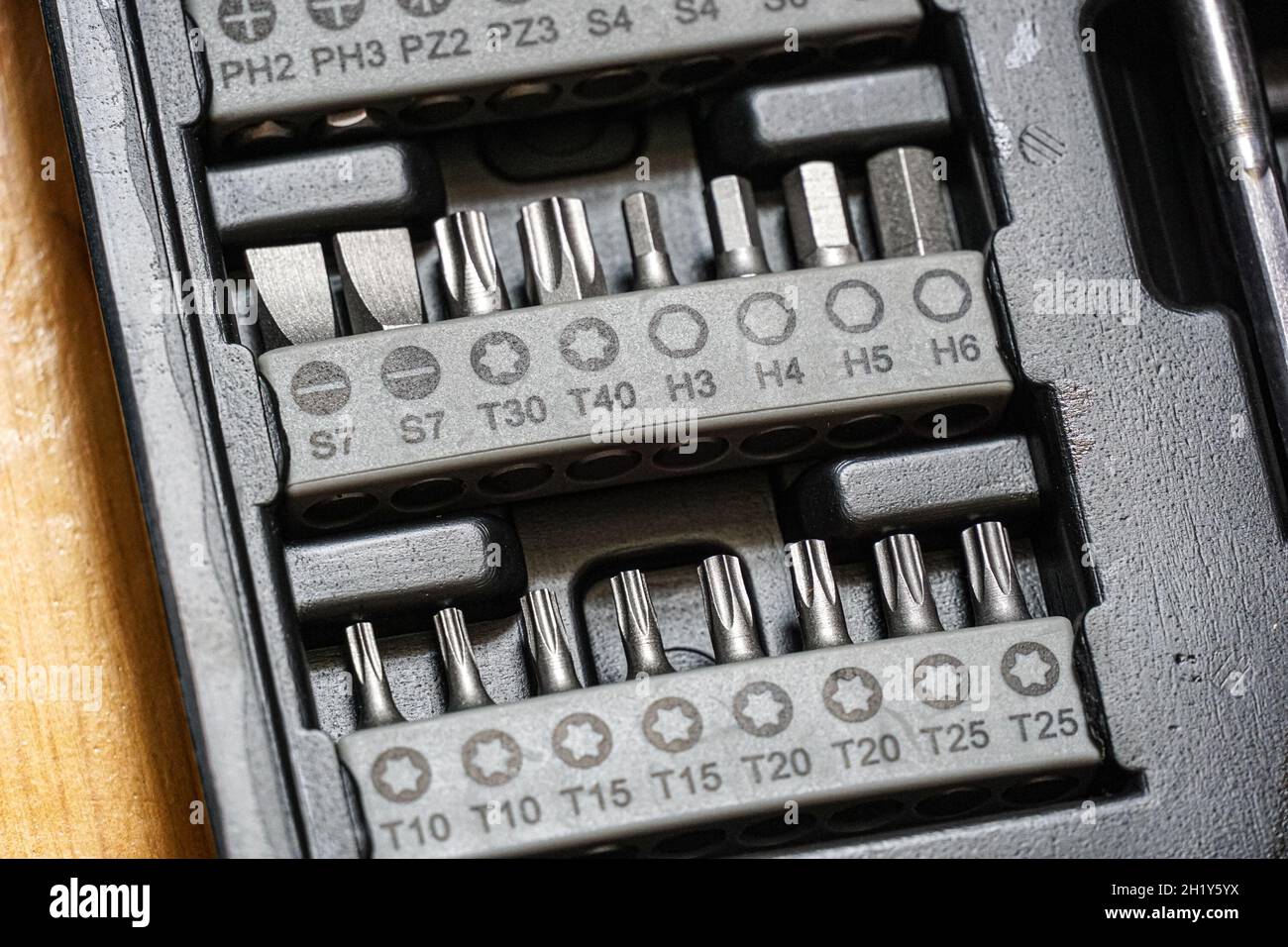 Screwdriver bits in a toolbox Stock Photo