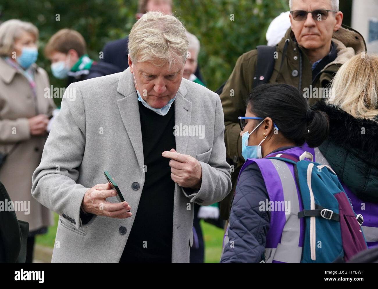 Forner Celtic player Frank McAvennie shows his vaccine passport to enter the ground before the UEFA Europa League Group G match at Celtic Park, Glasgow. Picture date: Tuesday October 18, 2021. Stock Photo