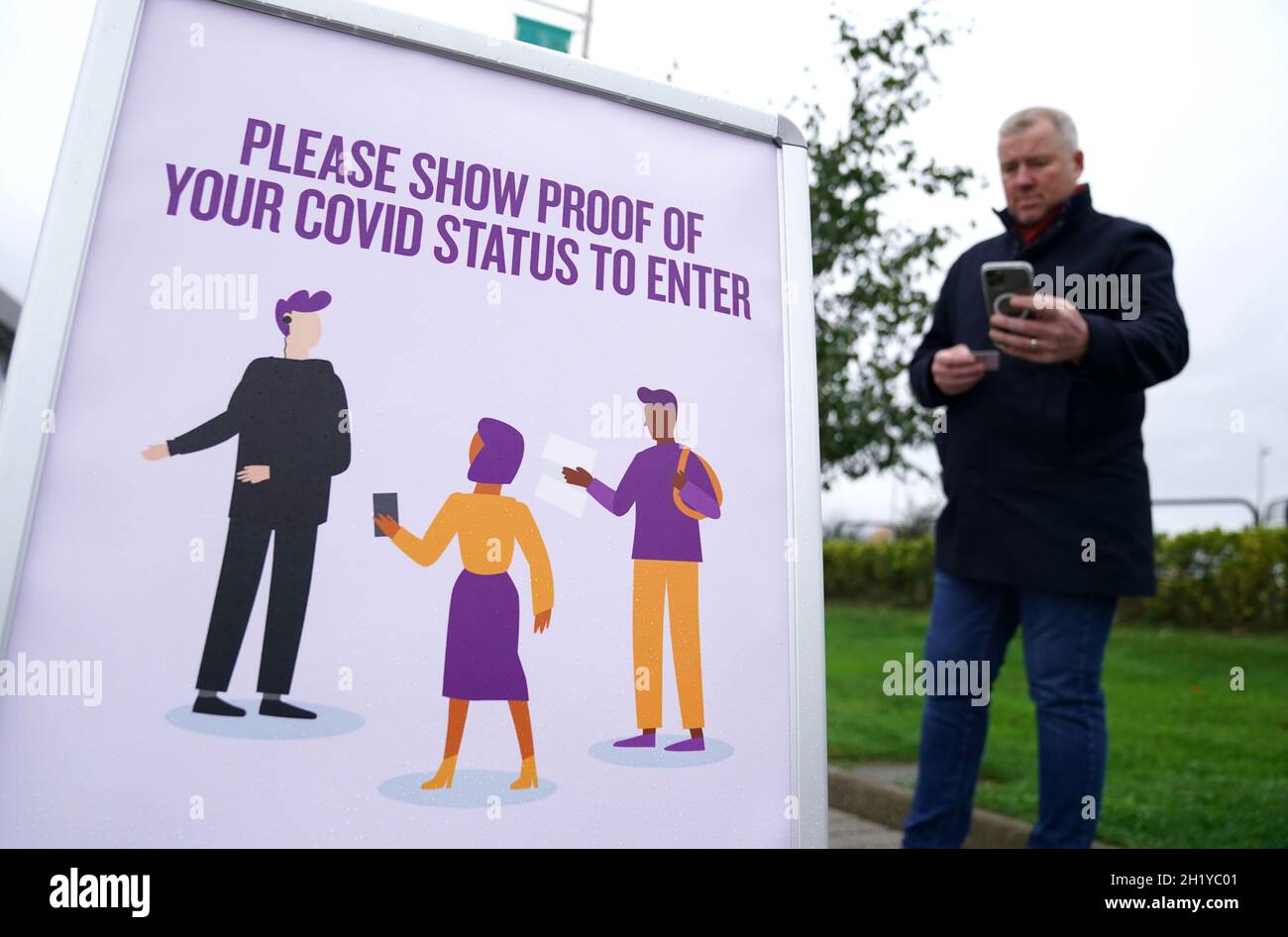 Signage informing spectators they need to show their vaccine passports ...