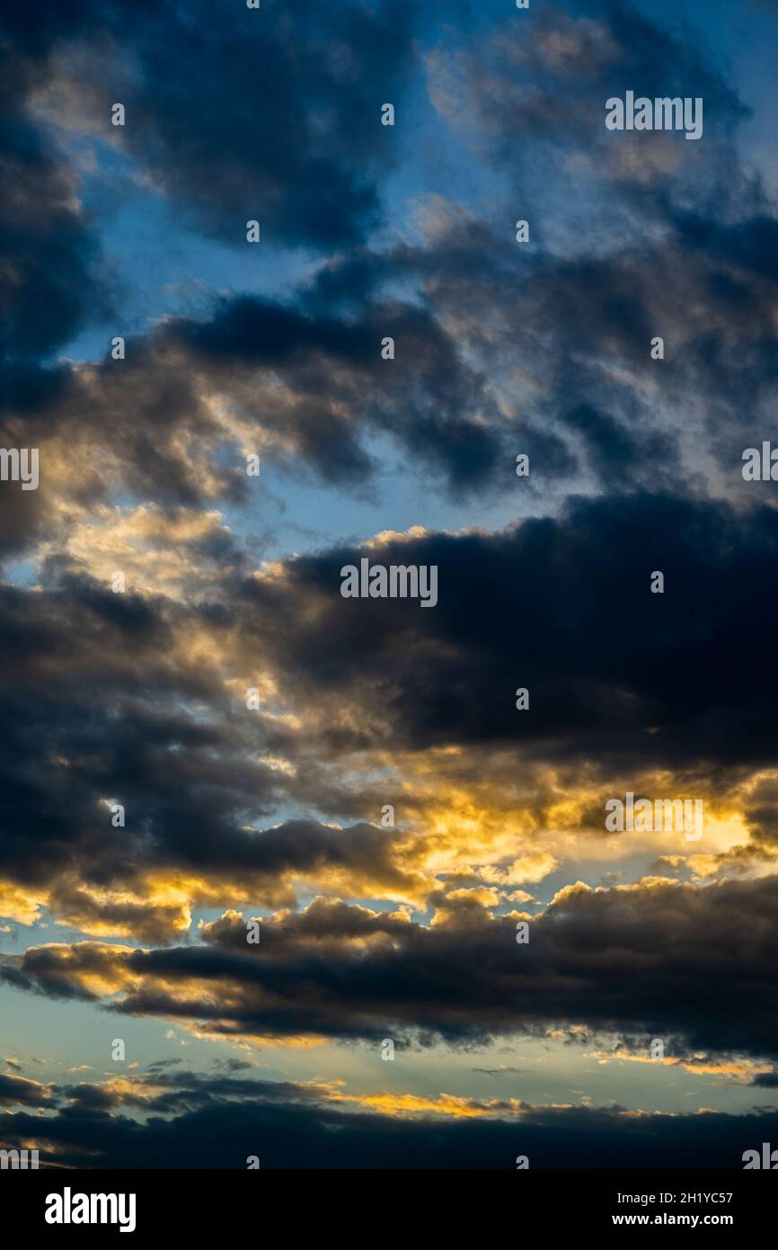 Sunset sky with orange clouds. Nature background Stock Photo - Alamy