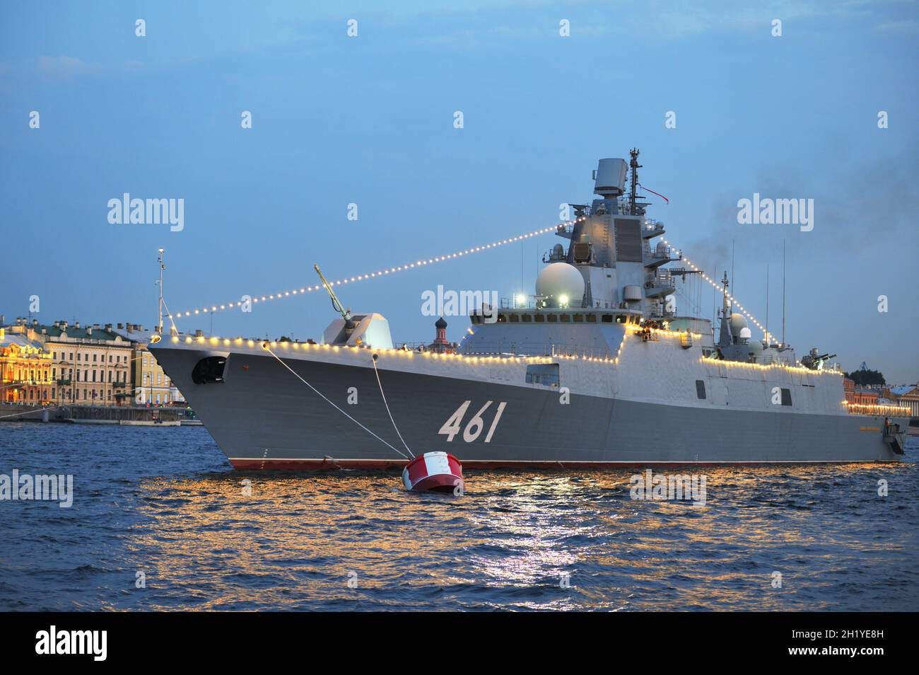 Illuminated Russian frigate Admiral Kasatonov, the Admiral Gorshkov-class frigate, preparing to the Navy Day parade in the night Neva river Stock Photo