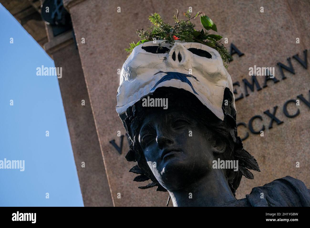 Environmentalist protest in the squares of many Italian cities.The blitz was carried out by members of Extintion Ribellion, during the night, they targeted the statues of the major Italian cities masks depicting a papier-mâché skull with a black 'x' covering the mouth were placed on the monuments in naples Stock Photo