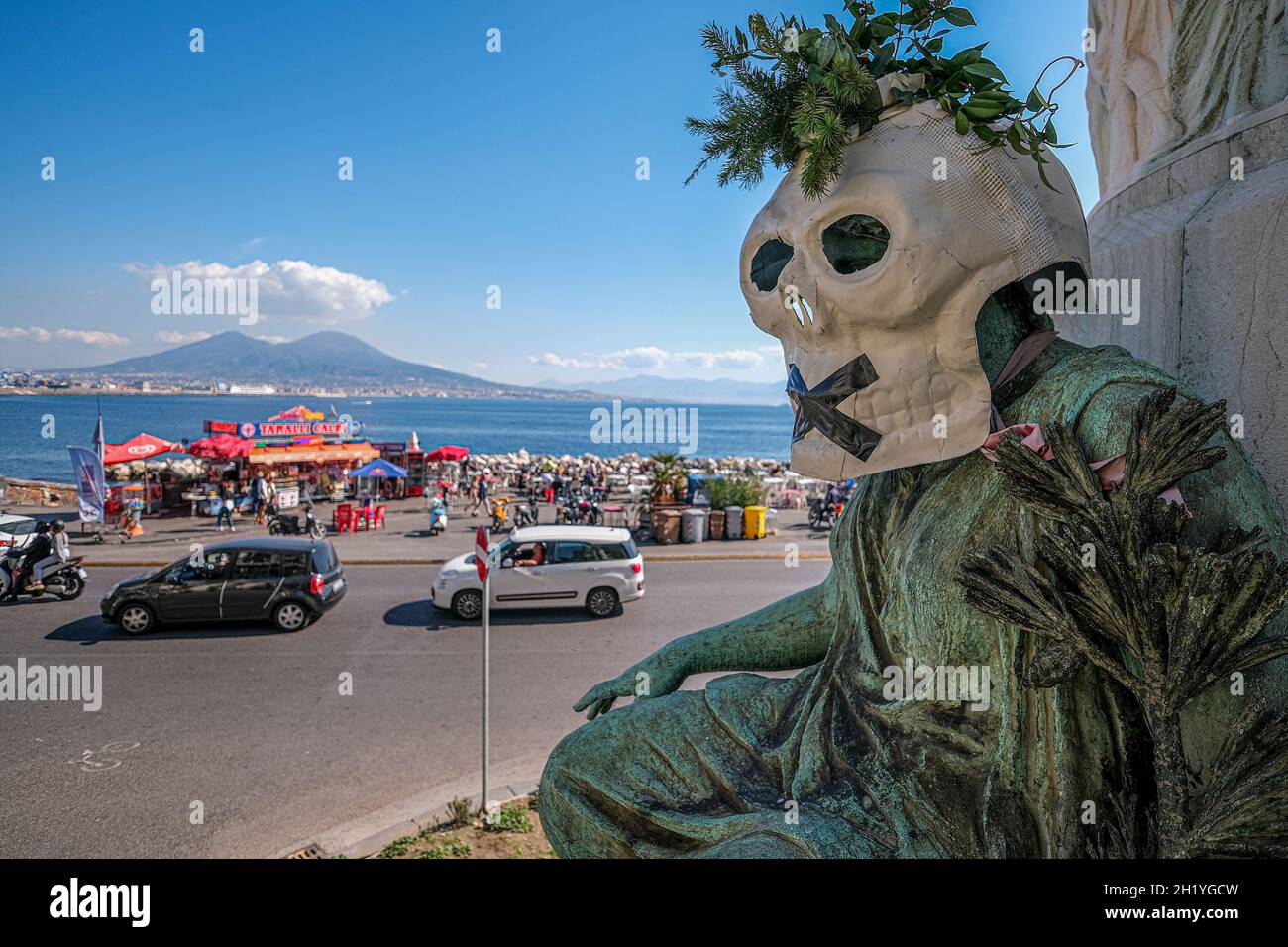 Environmentalist protest in the squares of many Italian cities.The blitz was carried out by members of Extintion Ribellion, during the night, they targeted the statues of the major Italian cities masks depicting a papier-mâché skull with a black 'x' covering the mouth were placed on the monuments in naples Stock Photo