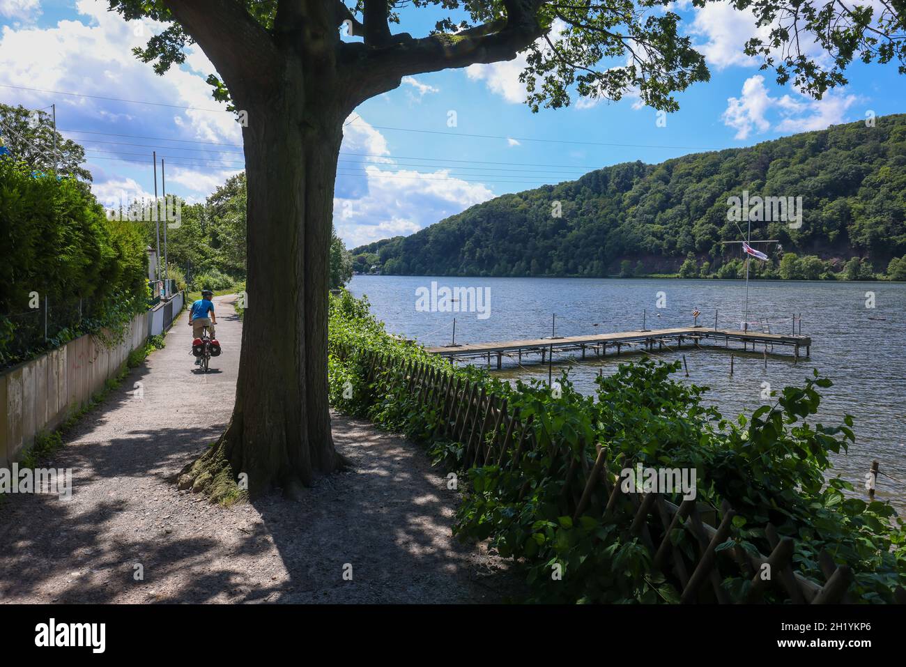 Hagen, North Rhine-Westphalia, Germany - Cyclists on the Ruhr Valley Cycle Path at Lake Hengstey, Lake Hengstey is a reservoir completed in 1929 and o Stock Photo
