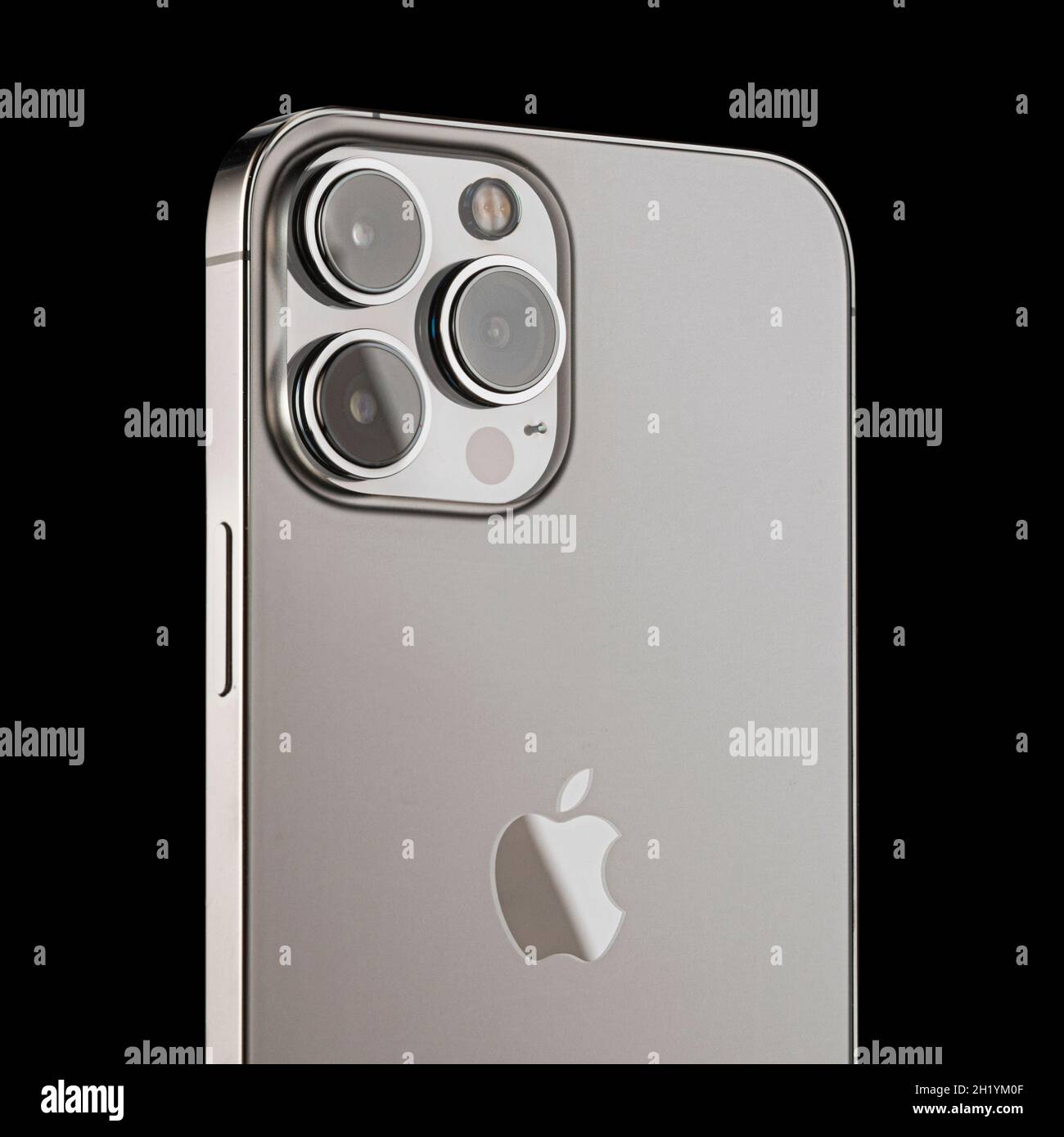 iPhone 13 pro on a black background. three close-up phone cameras, apple logo. russia, krasnoyarsk 13 october 2021. Stock Photo