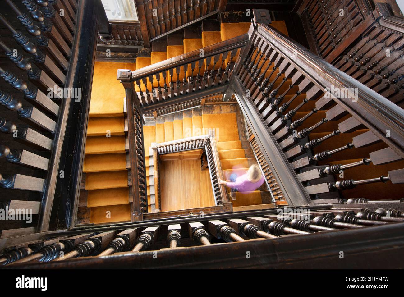 Looking down on spiralling wooden staircase, Sussex, England, United Kingdom, Europe Stock Photo