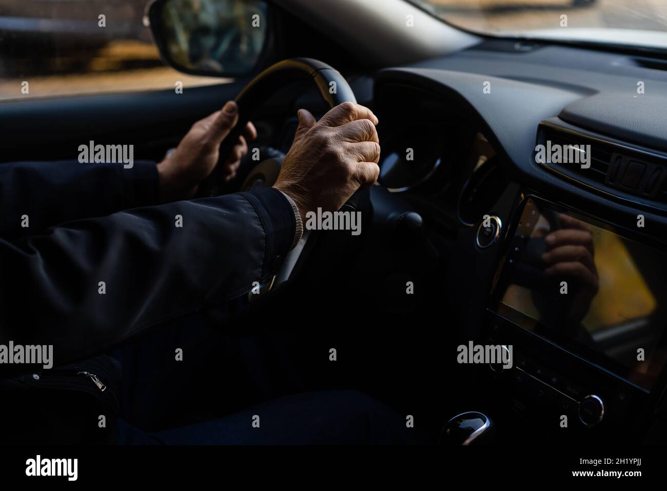 Elderly person driving a car. elderly man in a car Stock Photo Alamy