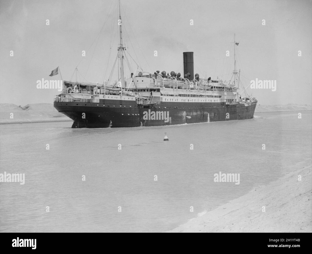 Vintage photo of a passenger ship passing through the Suez Canal circa 1925 Stock Photo