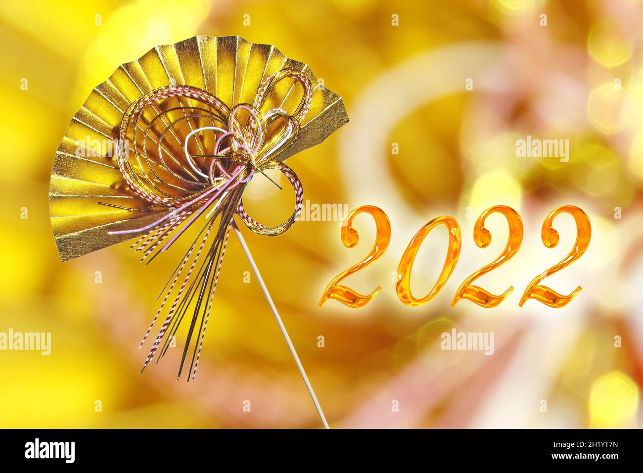 2022 golden numbers and a japanese traditional golden fan ornaments, asian new year card Stock Photo