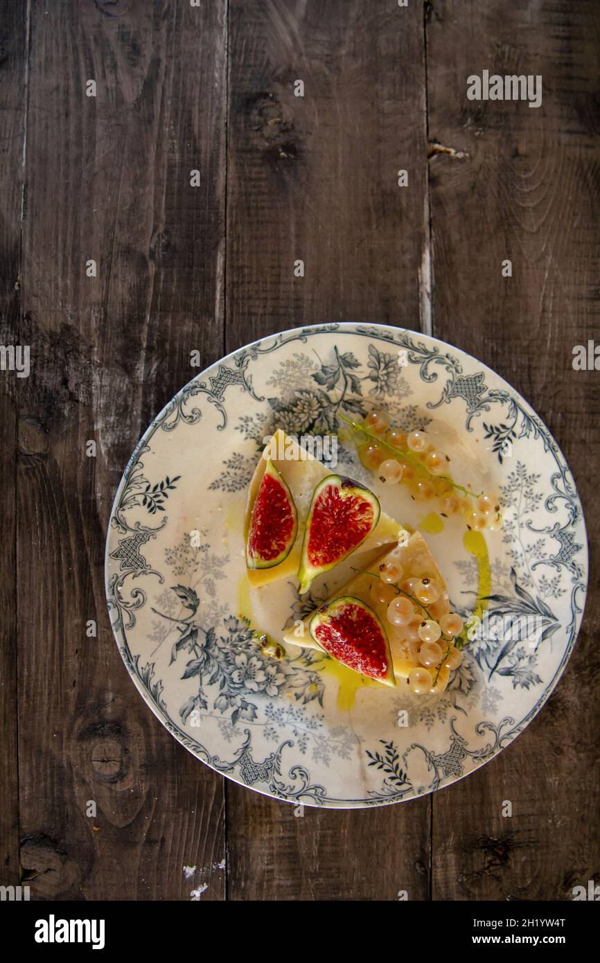 Pecorino, figs, currants and honey Stock Photo Alamy
