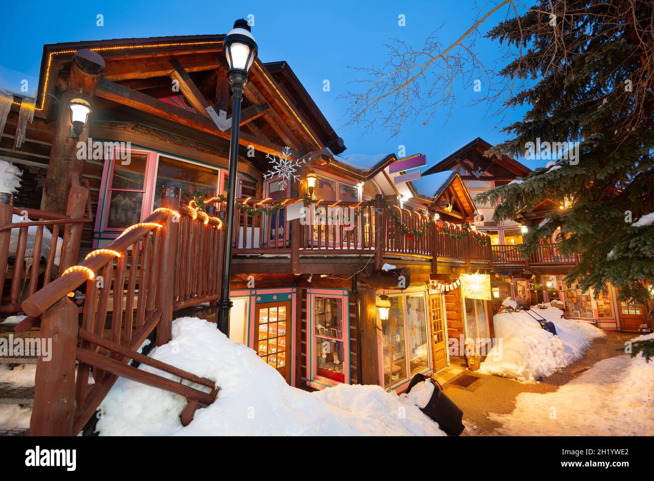 Breckenridge, Colorado, USA downtown streets at night in the winter with holiday lighting. Stock Photo