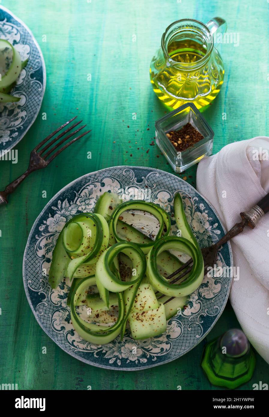 Cucumber salad with chilli flakes and olive oil Stock Photo Alamy