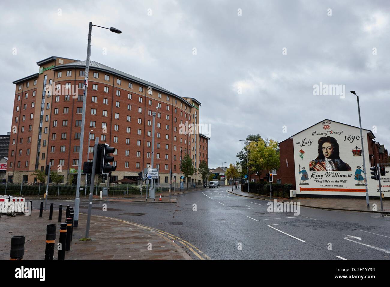 holiday inn hotel close proximity to loyalist king billy mural sandy row belfast northern ireland Stock Photo