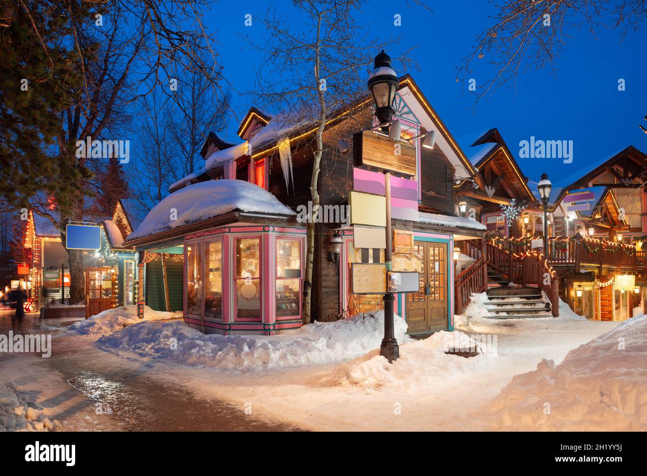 Breckenridge, Colorado, USA downtown streets at night in the winter with holiday lighting. Stock Photo