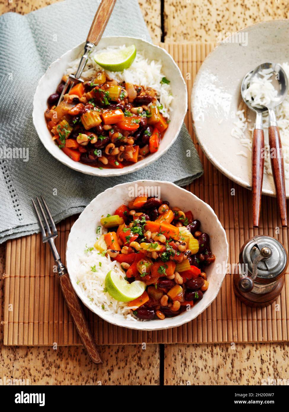 Vegetable chilli with black eyed beans and rice Stock Photo