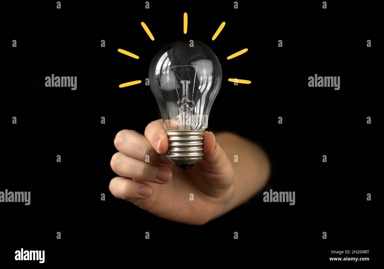 hand drawing light bulb and IDEA word design as concept Stock Photo - Alamy