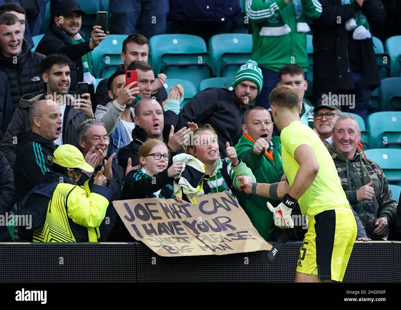 Celtic goalkeeper Joe Hart gives his shirt and gloves to a fan after the  final whistle during the UEFA Europa League Group G match at Celtic Park,  Glasgow. Picture date: Tuesday October